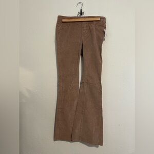 Free People
Pull-on corduroy flare pants.
Size 28 New-never worn with tags
